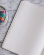 caderno aberto para escrever frases de agradecimento ao cliente
