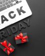 ideias-brindes-black-friday - Blog HM Brindes Teclado com letras formando “Black Friday” e presentes com laços vermelhos ilustrando brindes para Black Friday.